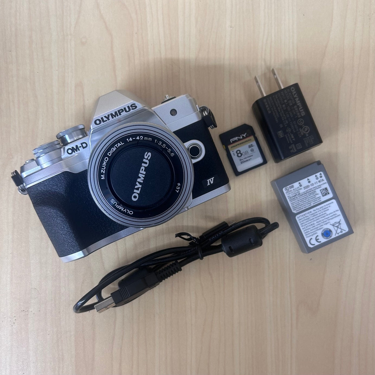 Used Olympus OM-D E-M10 MARK IV w/ M. Zuiko Digital 14-42mm f/3.5-5.6 EZ Lens Kit Silver